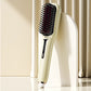 Brosse lissante à ions négatifs