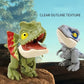Jouet dinosaure mordant le doigt