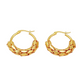 Boucles d'oreilles créoles texturées pour femme